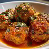 A bowl of frozen meatballs.