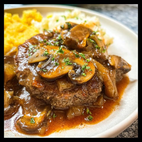 A plate of food with mushrooms and onions on it.