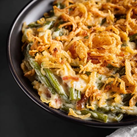 A bowl of green bean casserole.