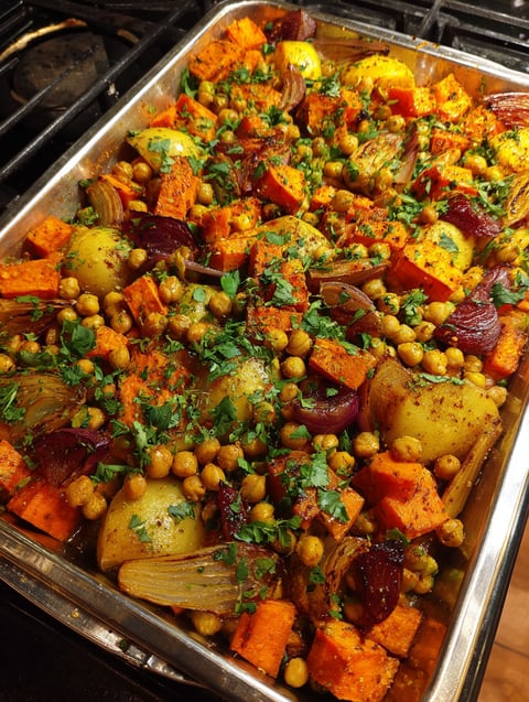 A dish of curried sweet potatoes and chickpeas.