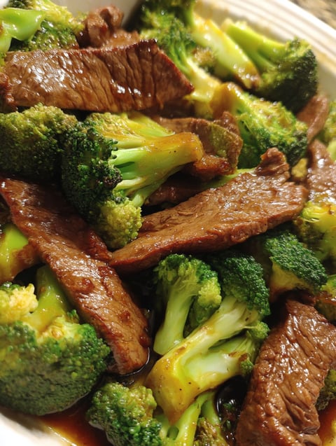 A close up of a delicious Chinese beef and broccoli dish.